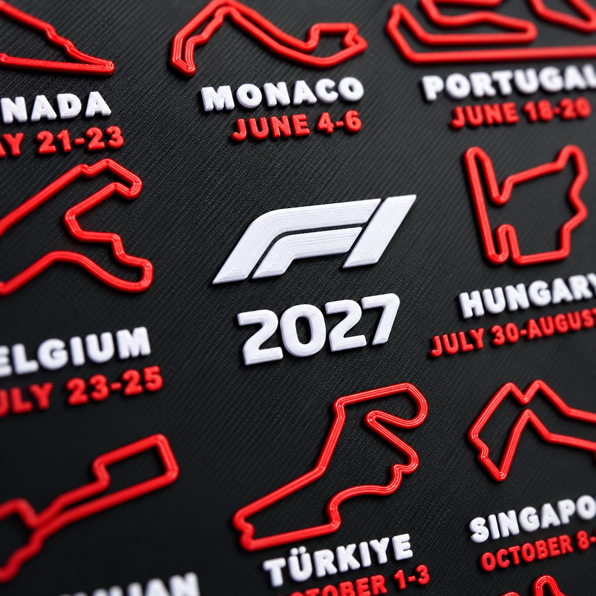 Macro detail of the raised 3D printed circuits – Monaco, Hungary, Belgium and Singapore with race dates