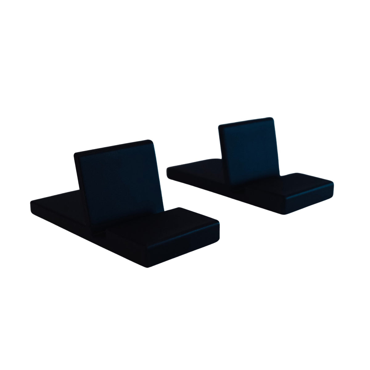 The two black 3D printed stand feet included with the race calendar