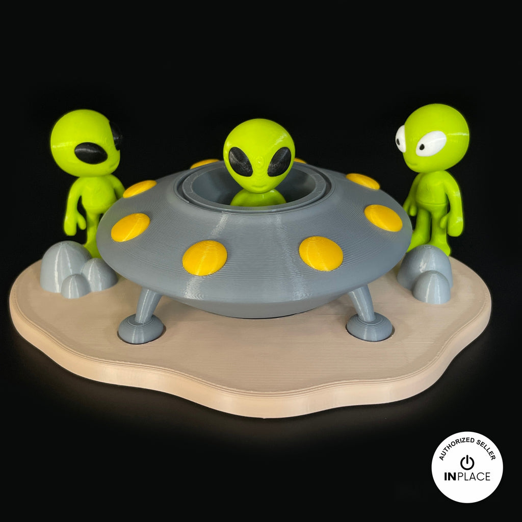 3D printed ufo landing site platform by RU3D, shown with the Alien keychain
