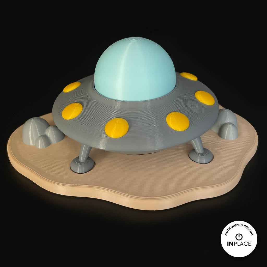 3D printed ufo landing site platform by RU3D, shown with the Alien keychain