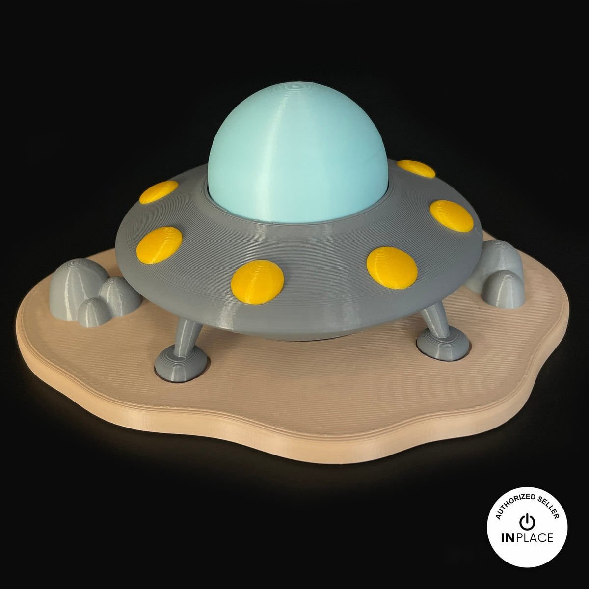 3D printed ufo landing site platform by RU3D, shown with the Alien keychain