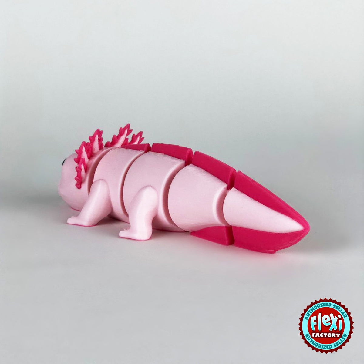 Cute axolotl keychain, 3D printed by RU3D – dark eyes rear view. Pink with hot pink gills and tail.