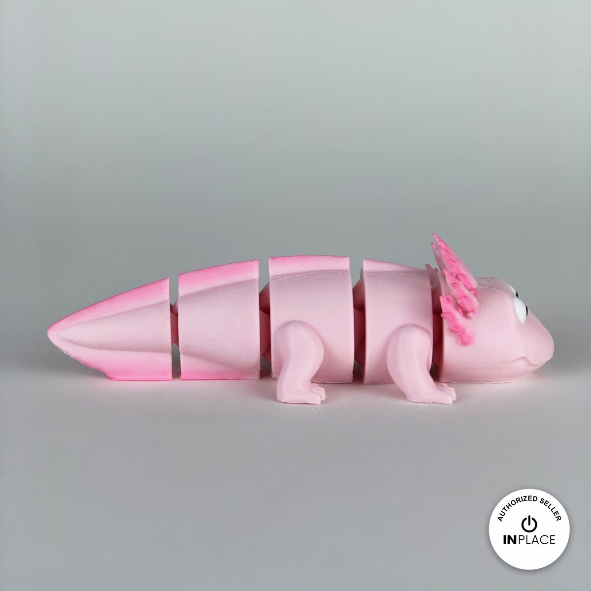Cute axolotl keychain, 3D printed by RU3D – version 2 side view facing right. Pink with hot pink gills and tail.