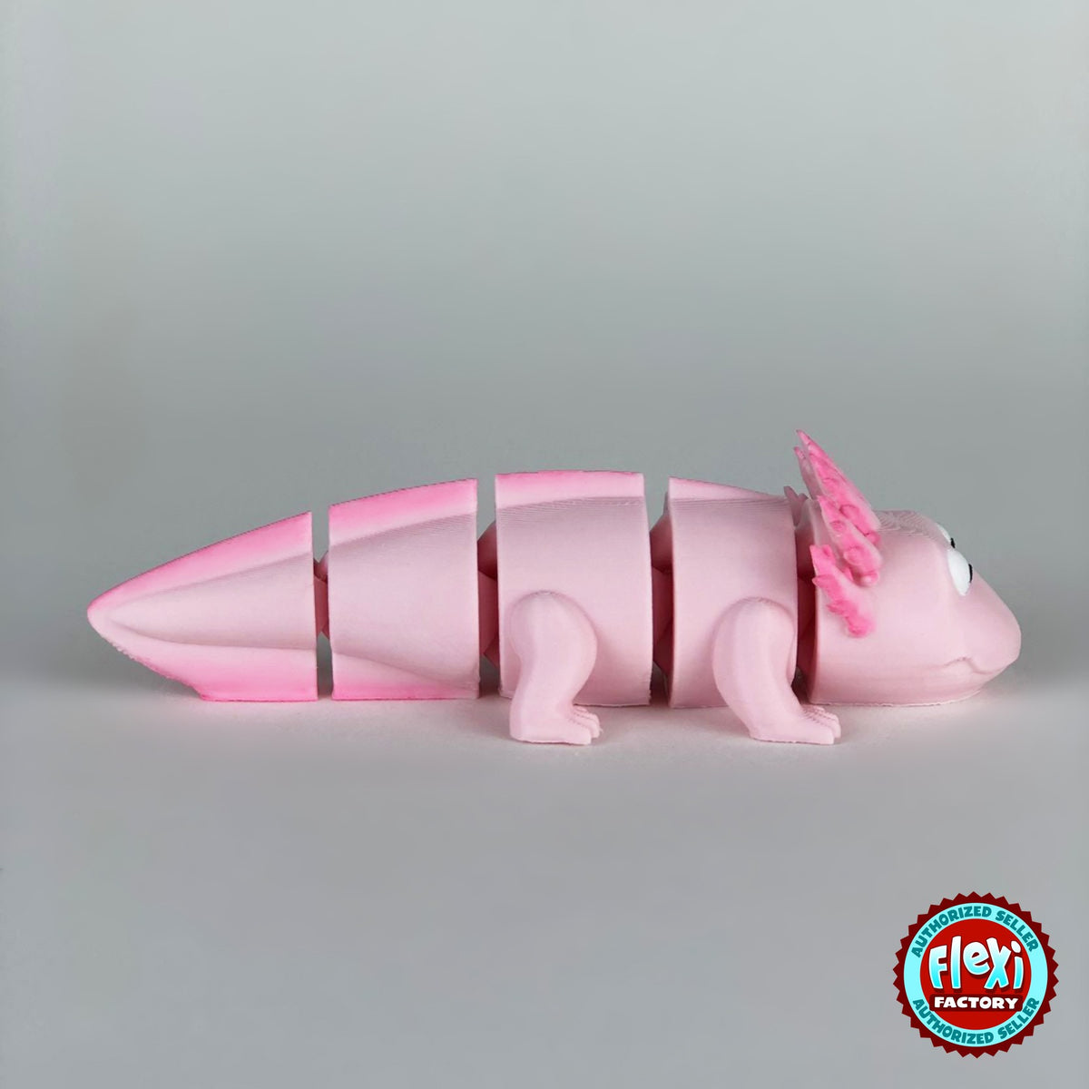 Cute axolotl keychain, 3D printed by RU3D – version 2 side view facing right. Pink with hot pink gills and tail.
