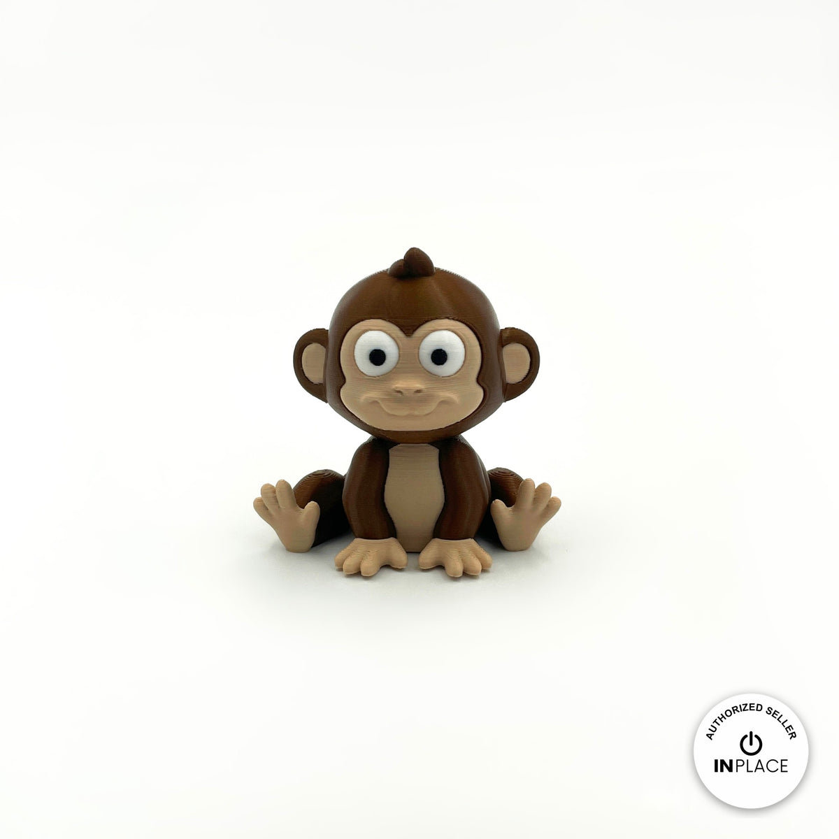Cute baby monkey keychain, 3D printed by RU3D – sitting front view. Dark brown with tan face.
