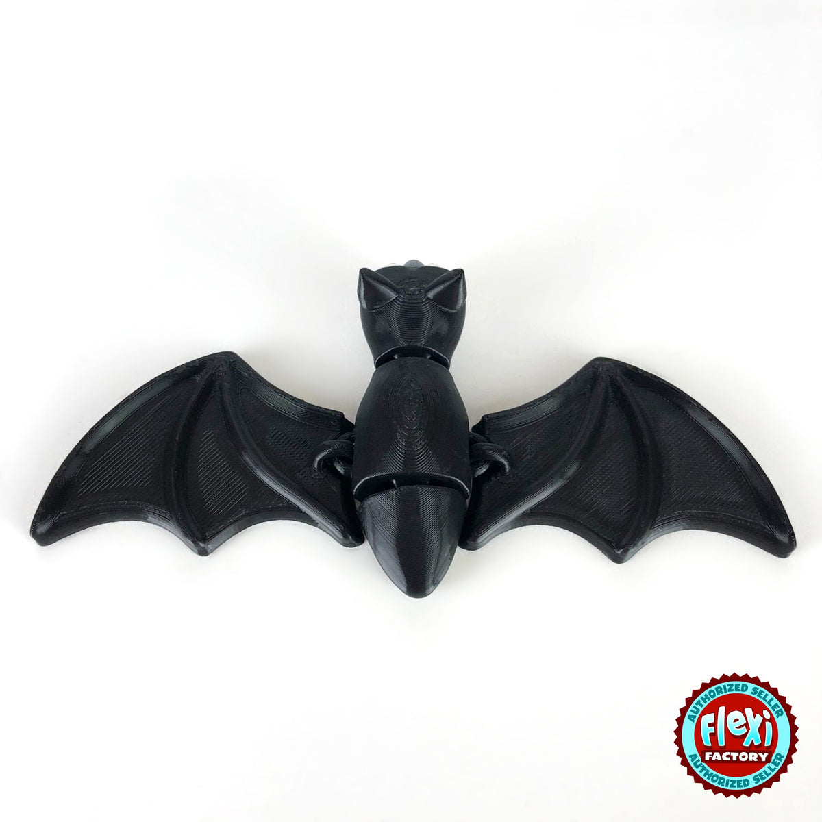Cute bat keychain, 3D printed by RU3D – back view wings spread. Black with grey ears and white fangs.