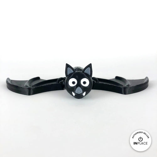 Cute bat keychain, 3D printed by RU3D – front view wings spread. Black with grey ears and white fangs.