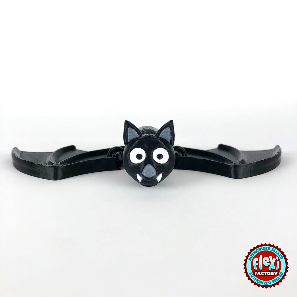 Cute bat keychain, 3D printed by RU3D – front view wings spread. Black with grey ears and white fangs.