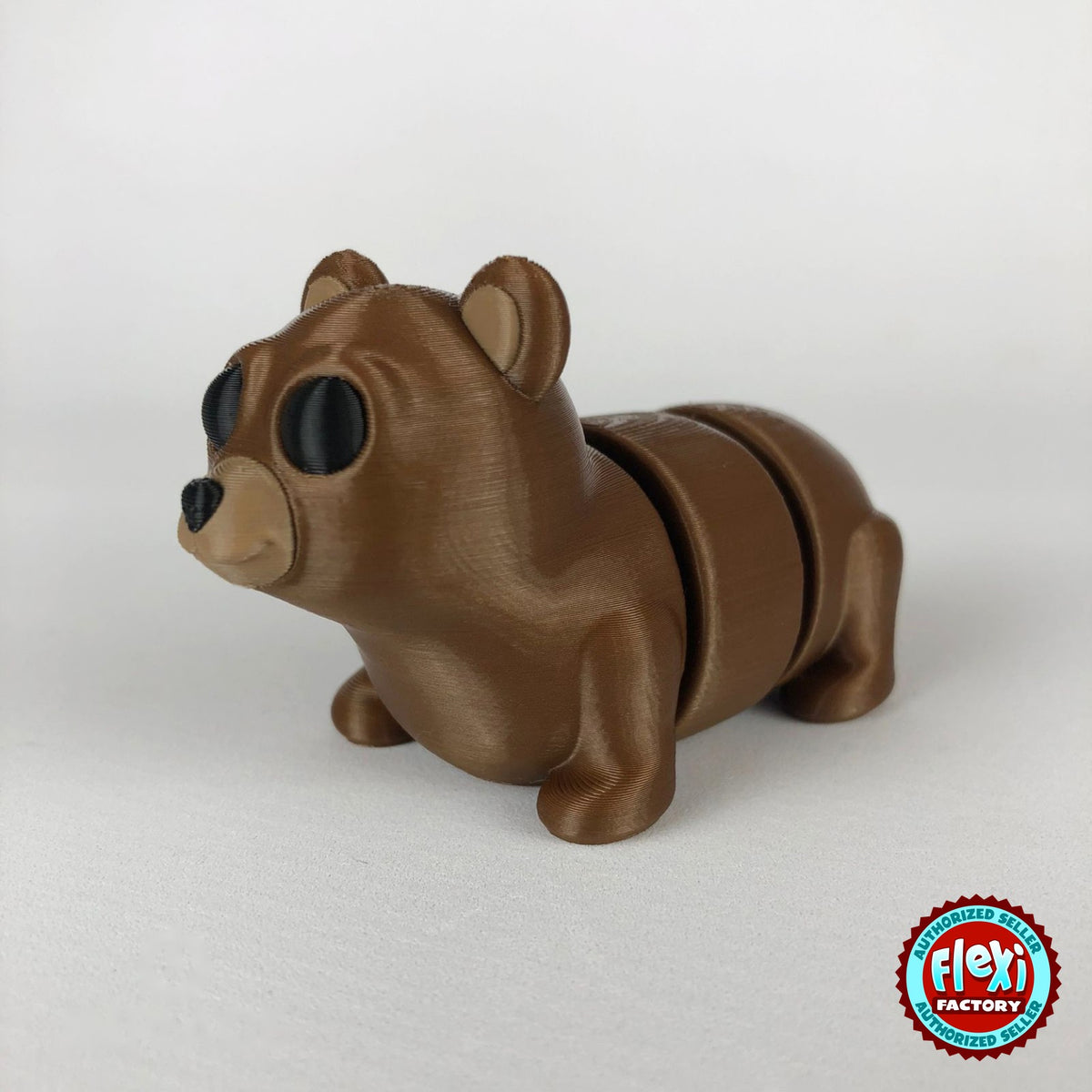 Cute bear keychain, 3D printed by RU3D – dark eyes three quarter view facing left. Brown.