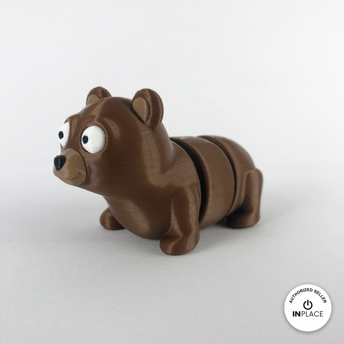 Cute bear keychain, 3D printed by RU3D – three quarter view facing left. Brown.