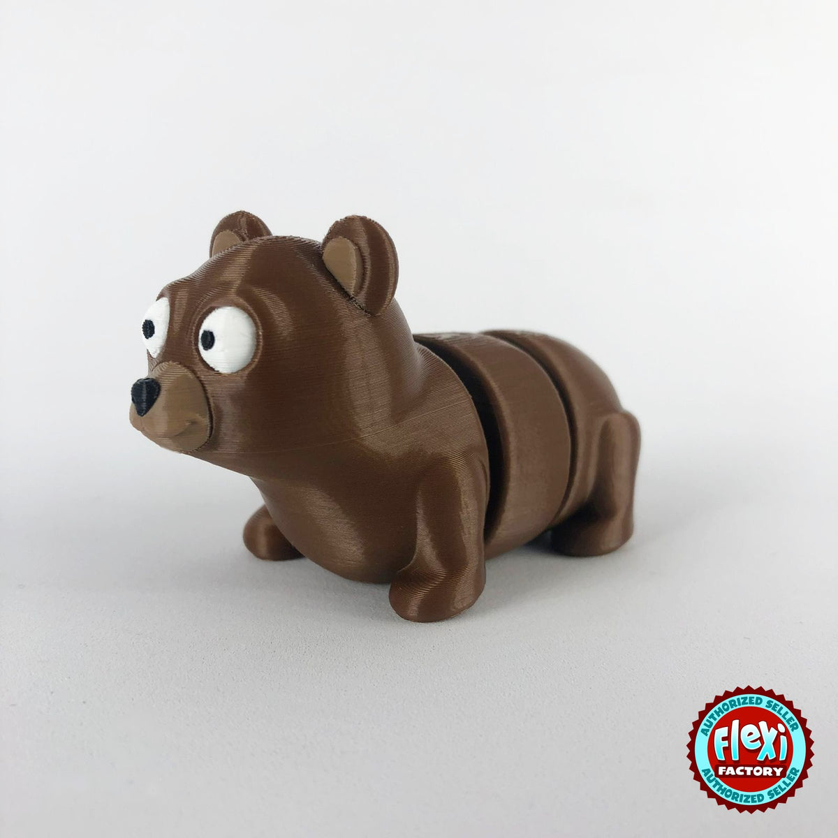 Cute bear keychain, 3D printed by RU3D – three quarter view facing left. Brown.