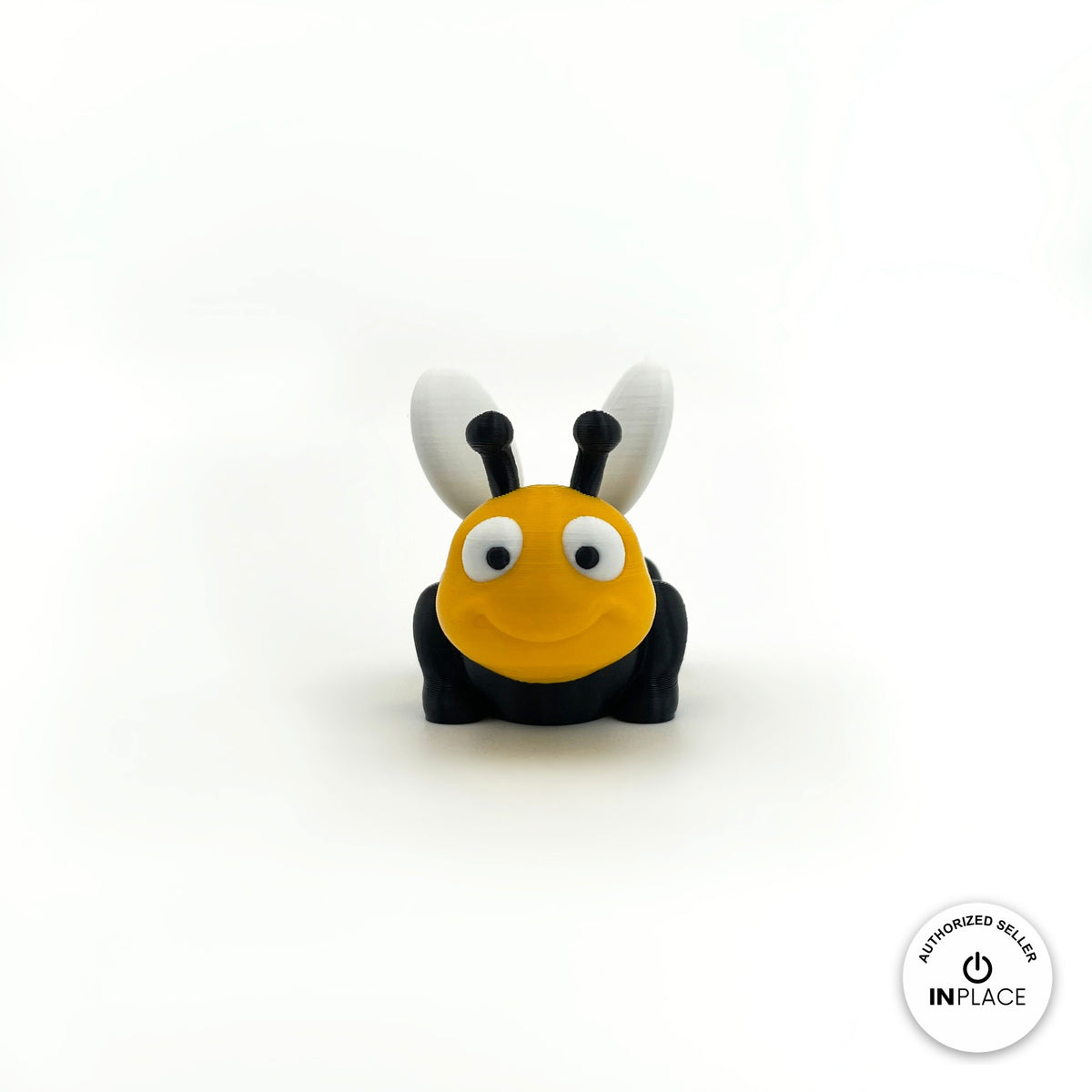 Cute bee keychain, 3D printed by RU3D – front view. Yellow and black with white wings.