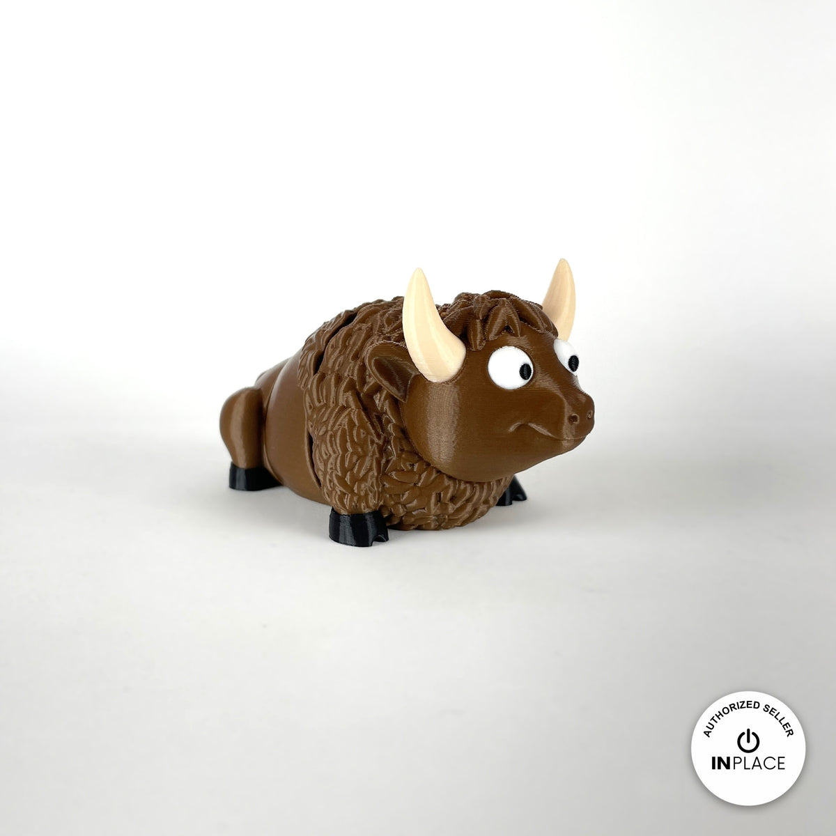 Cute bison keychain, 3D printed by RU3D – front view. Brown with cream horns and black hooves.