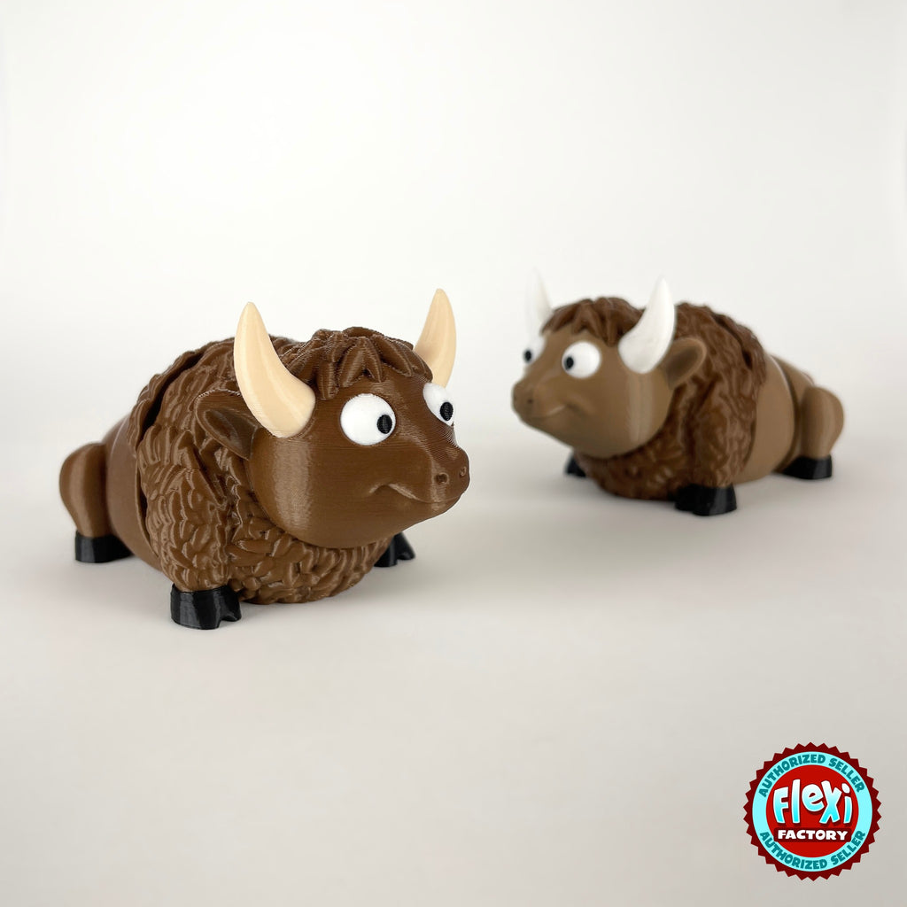 Cute bison keychain, 3D printed by RU3D – pair of bison. Brown with cream horns and black hooves.