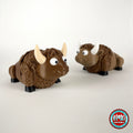 Cute bison keychain, 3D printed by RU3D – pair of bison. Brown with cream horns and black hooves.