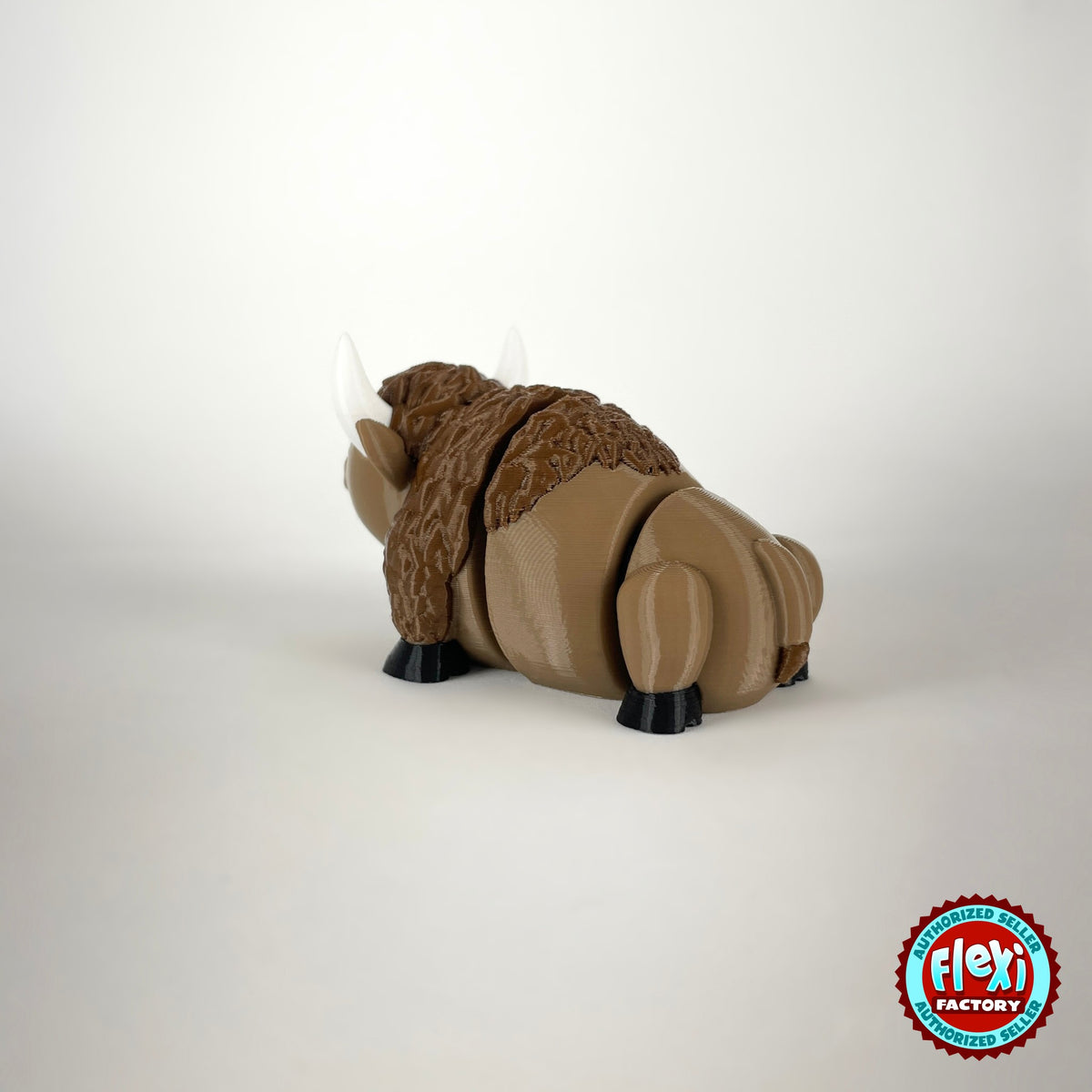 Cute bison keychain, 3D printed by RU3D – rear three quarter view. Brown with cream horns and black hooves.