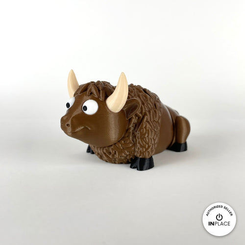Cute bison keychain, 3D printed by RU3D – three quarter view facing left. Brown with cream horns and black hooves.