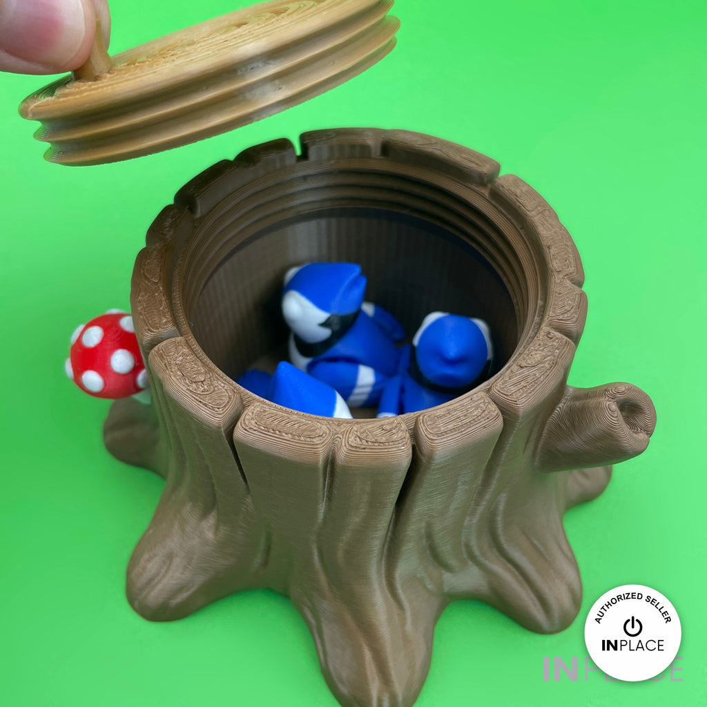 3D printed tree stump box platform by RU3D, shown with the Blue Jay keychain
