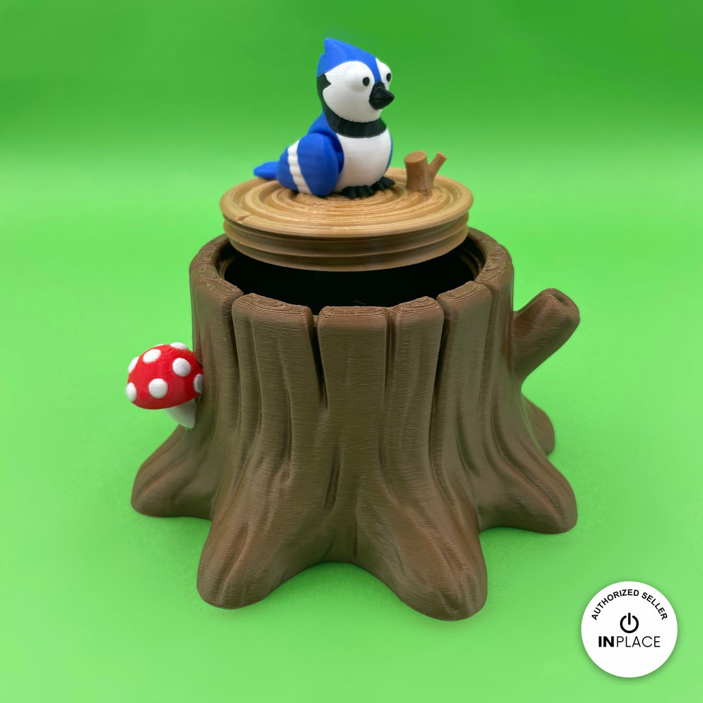 3D printed tree stump box platform by RU3D, shown with the Blue Jay keychain