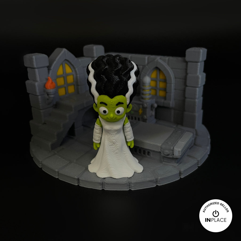 3D printed laboratory generator platform by RU3D, shown with the Bride of Frankenstein keychain