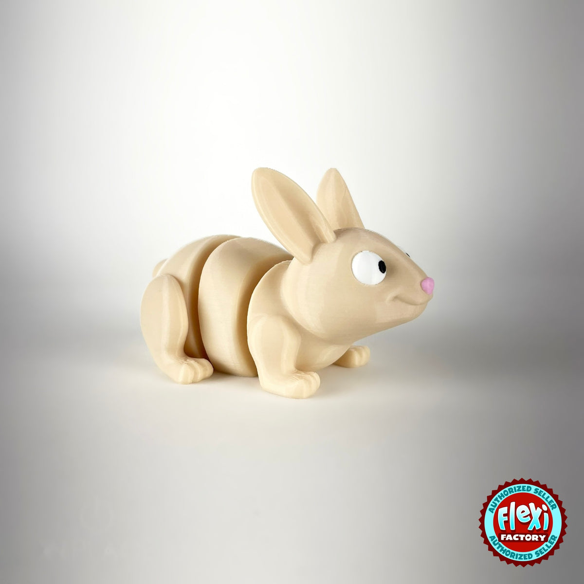 Cute bunny rabbit keychain, 3D printed by RU3D – front three quarter view. Cream with pink ears and orange carrots.