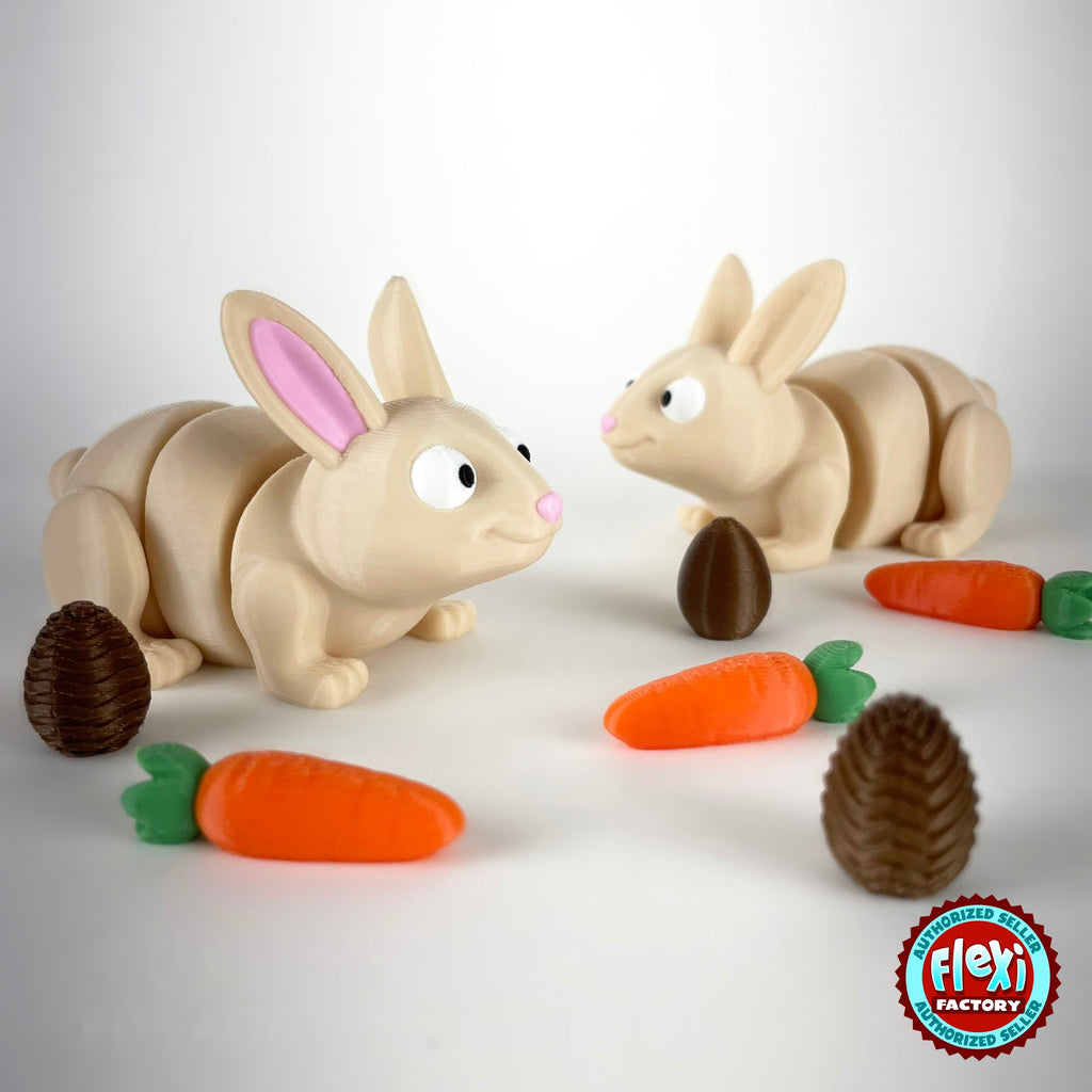 Cute bunny rabbit keychain, 3D printed by RU3D – pair of bunnies with carrots and eggs. Cream with pink ears and orange carrots.