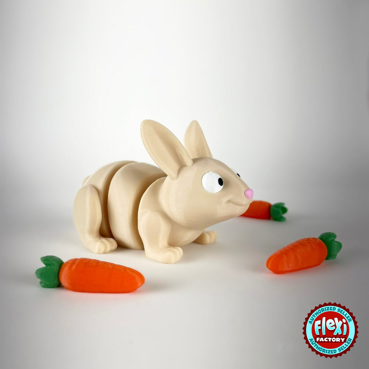 Cute bunny rabbit keychain, 3D printed by RU3D – sniffing carrot facing right. Cream with pink ears and orange carrots.