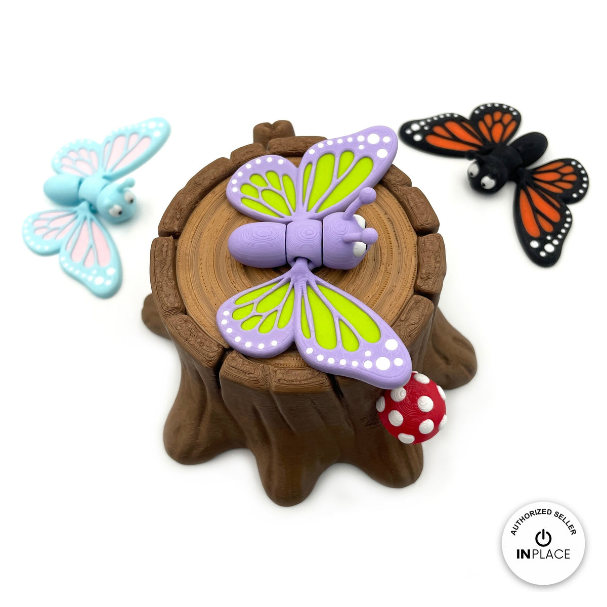 3D printed tree stump box platform by RU3D, shown with the Butterfly keychain