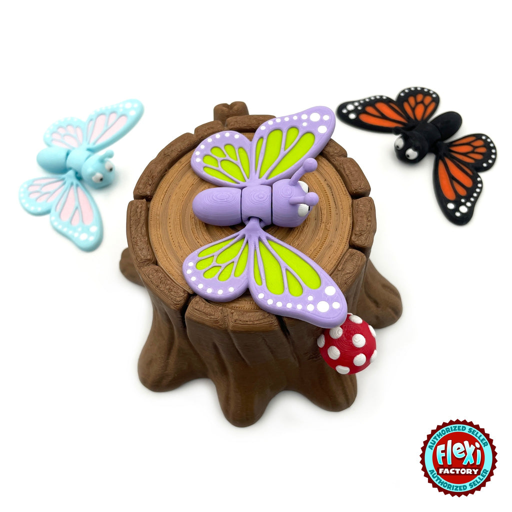 Cute butterfly keychain, 3D printed by RU3D – three butterflies on tree stump box. Purple and lime green with tree stump box.