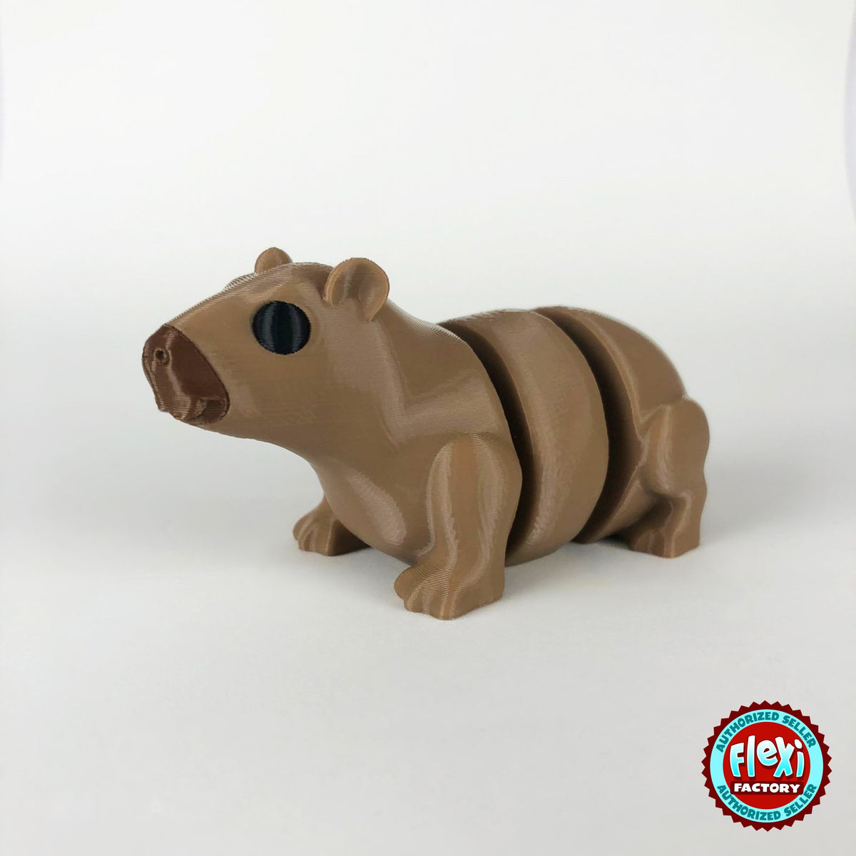 Cute capybara keychain, 3D printed by RU3D – dark eyes three quarter view facing left. Light brown.