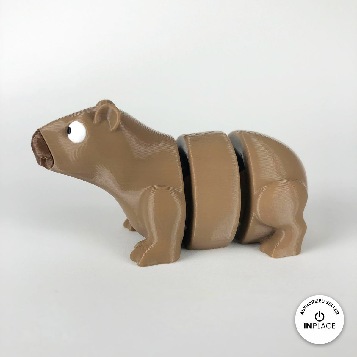 Cute capybara keychain, 3D printed by RU3D – side view facing left. Light brown.