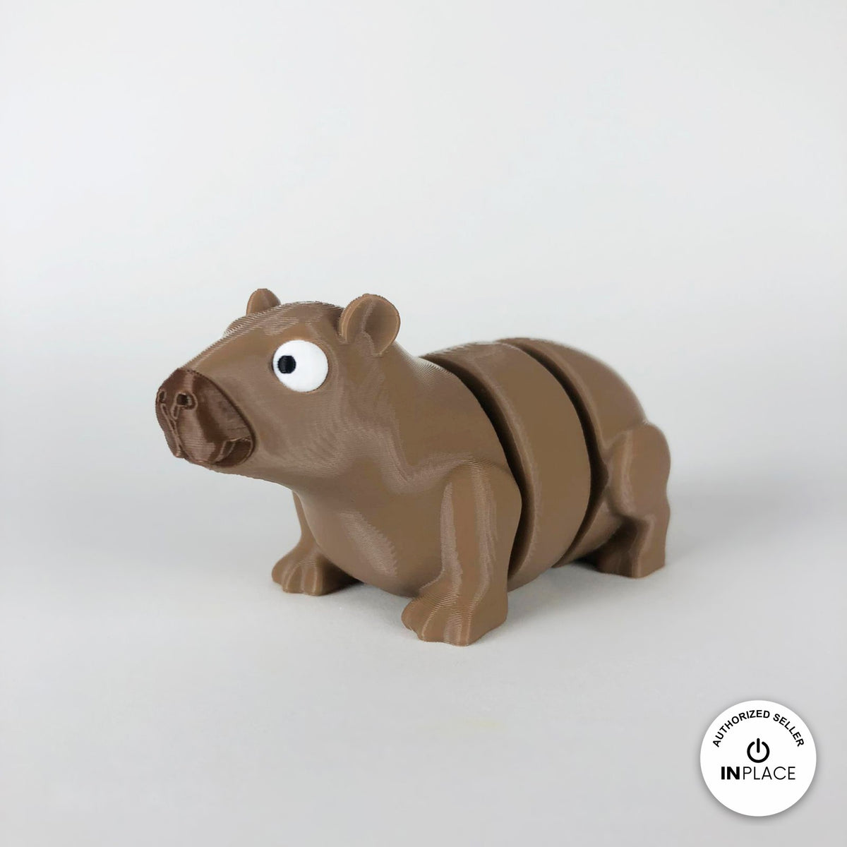 Cute capybara keychain, 3D printed by RU3D – three quarter view facing left. Light brown.