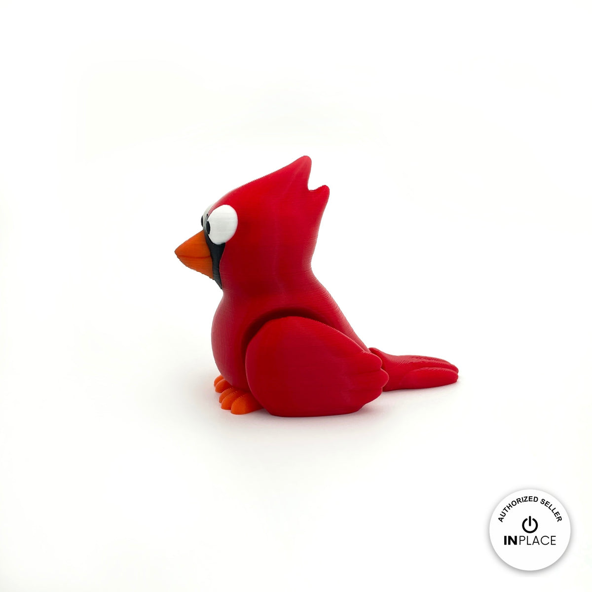 Cute cardinal bird keychain, 3D printed by RU3D – side view facing left. Bright red with orange beak.