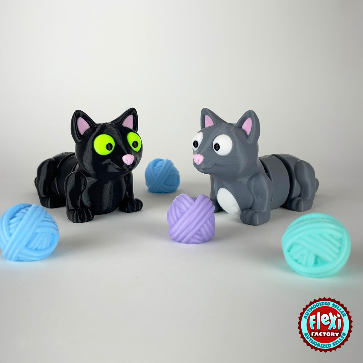 Cute cat keychain, 3D printed by RU3D – black and grey cats with yarn balls. Black cat and grey cat with yarn balls.
