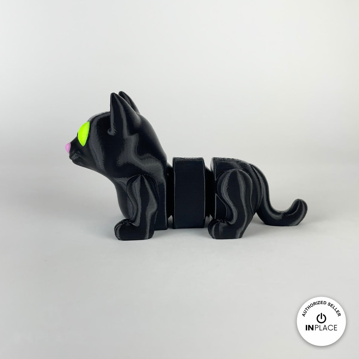 Cute cat keychain, 3D printed by RU3D – black cat side view facing left. Black cat and grey cat with yarn balls.
