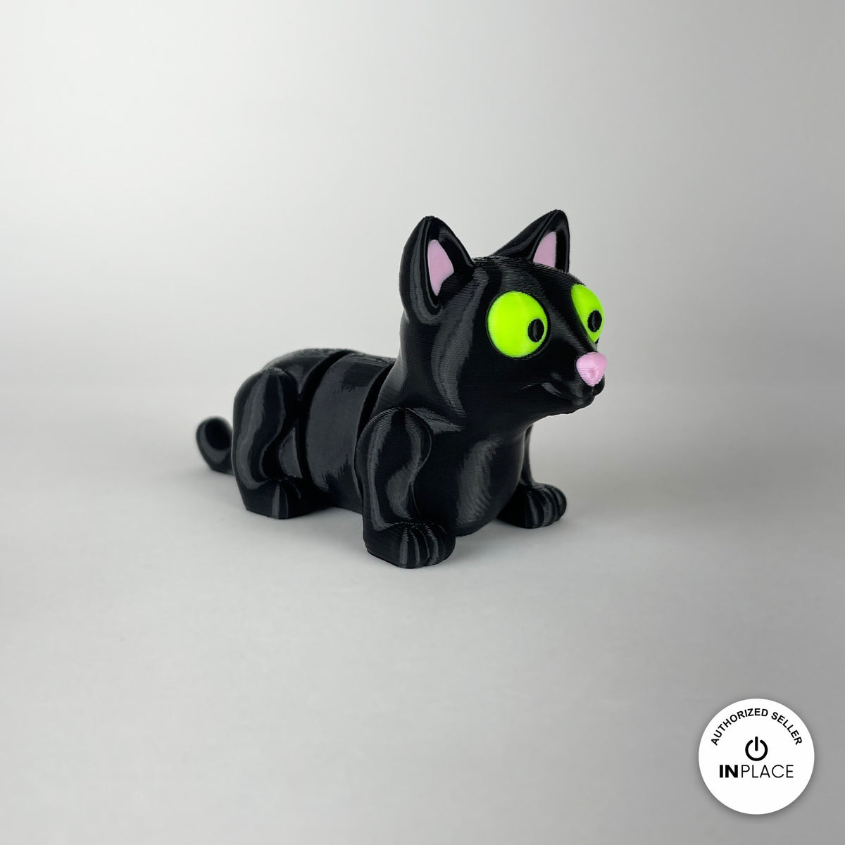 Cute cat keychain, 3D printed by RU3D – black cat three quarter view. Black cat and grey cat with yarn balls.