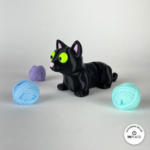 3D printed ball of wool accessory by RU3D, shown with the Cat keychain