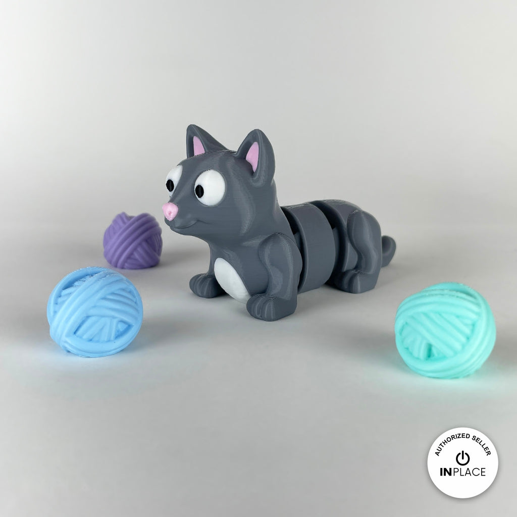 3D printed ball of wool accessory by RU3D, shown with the Cat keychain