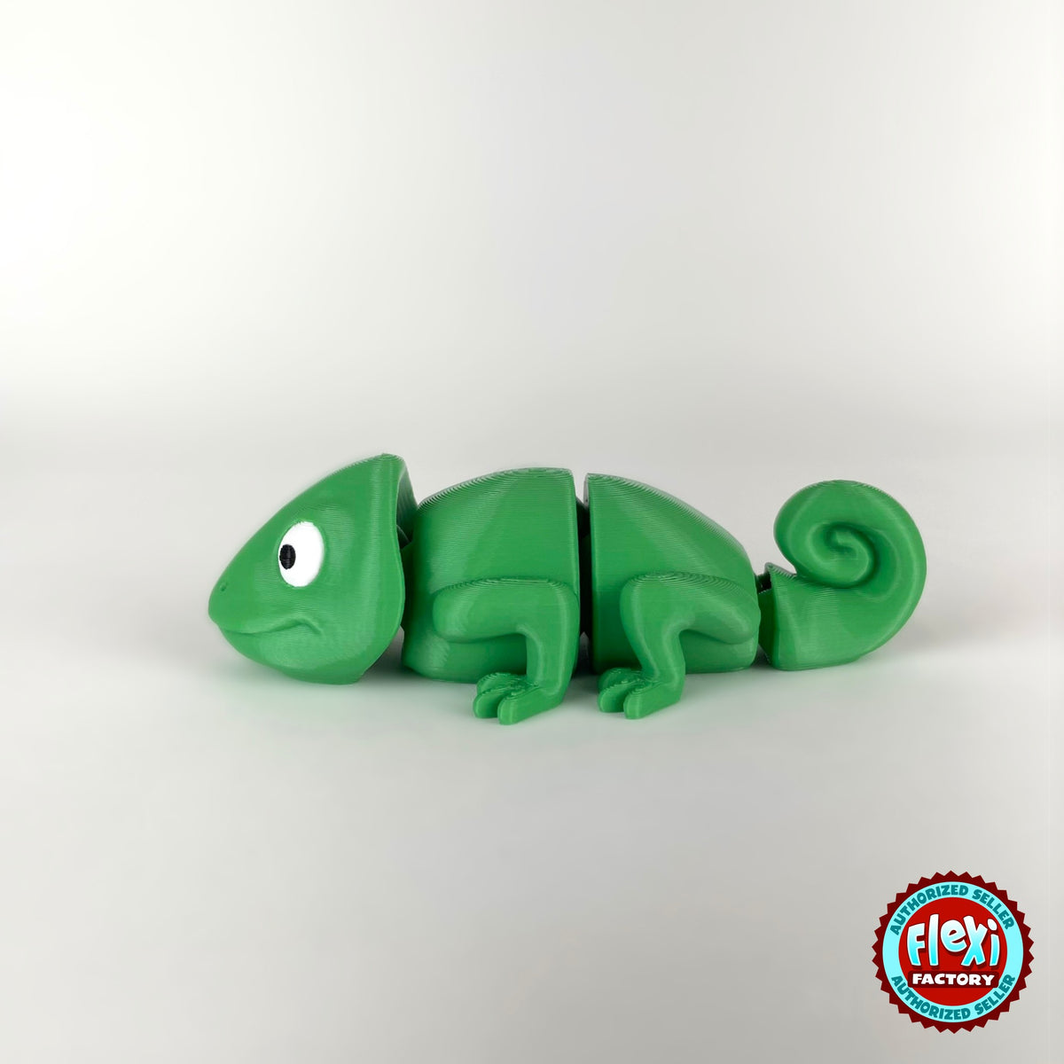 Cute chameleon keychain, 3D printed by RU3D – side view facing left. Bright green.