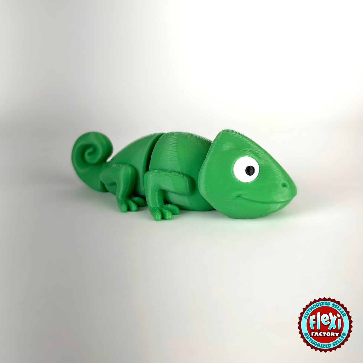 Cute chameleon keychain, 3D printed by RU3D – three quarter view facing right. Bright green.
