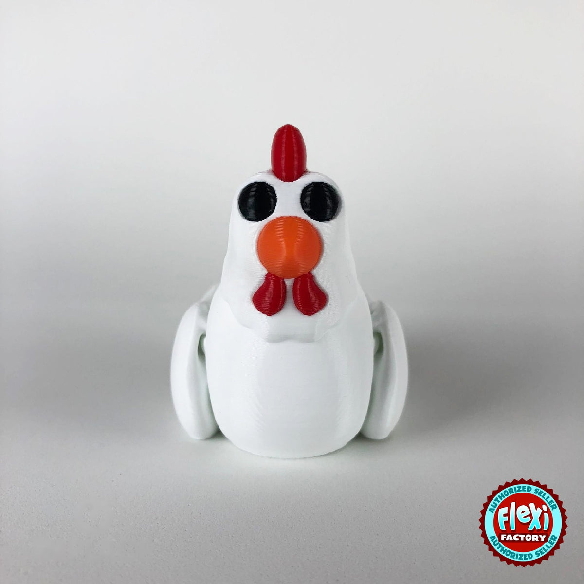 Cute chicken keychain, 3D printed by RU3D – white hen dark eyes front view. White hen with red comb and orange beak, also in cream.