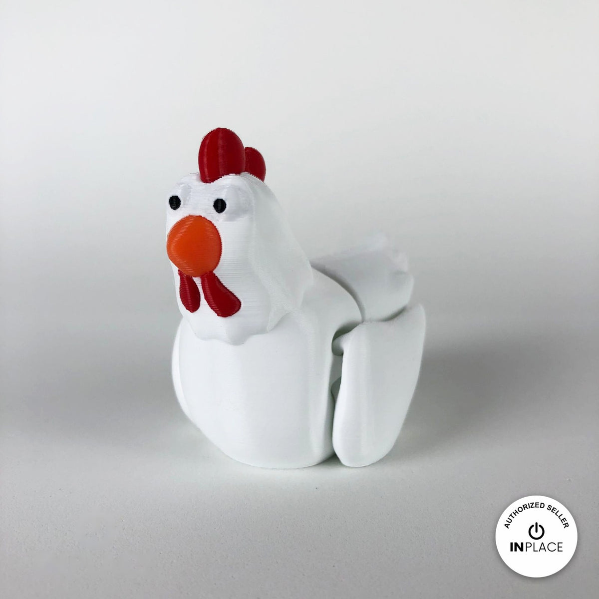 Cute chicken keychain, 3D printed by RU3D – white hen front view. White hen with red comb and orange beak, also in cream.