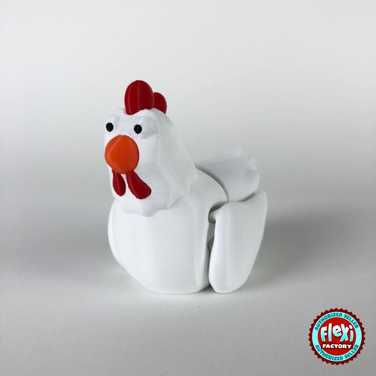 Cute chicken keychain, 3D printed by RU3D – white hen front view. White hen with red comb and orange beak, also in cream.