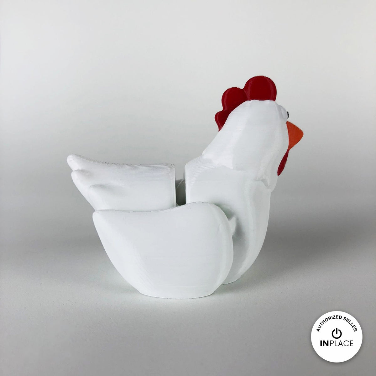 Cute chicken keychain, 3D printed by RU3D – white hen side view facing right. White hen with red comb and orange beak, also in cream.