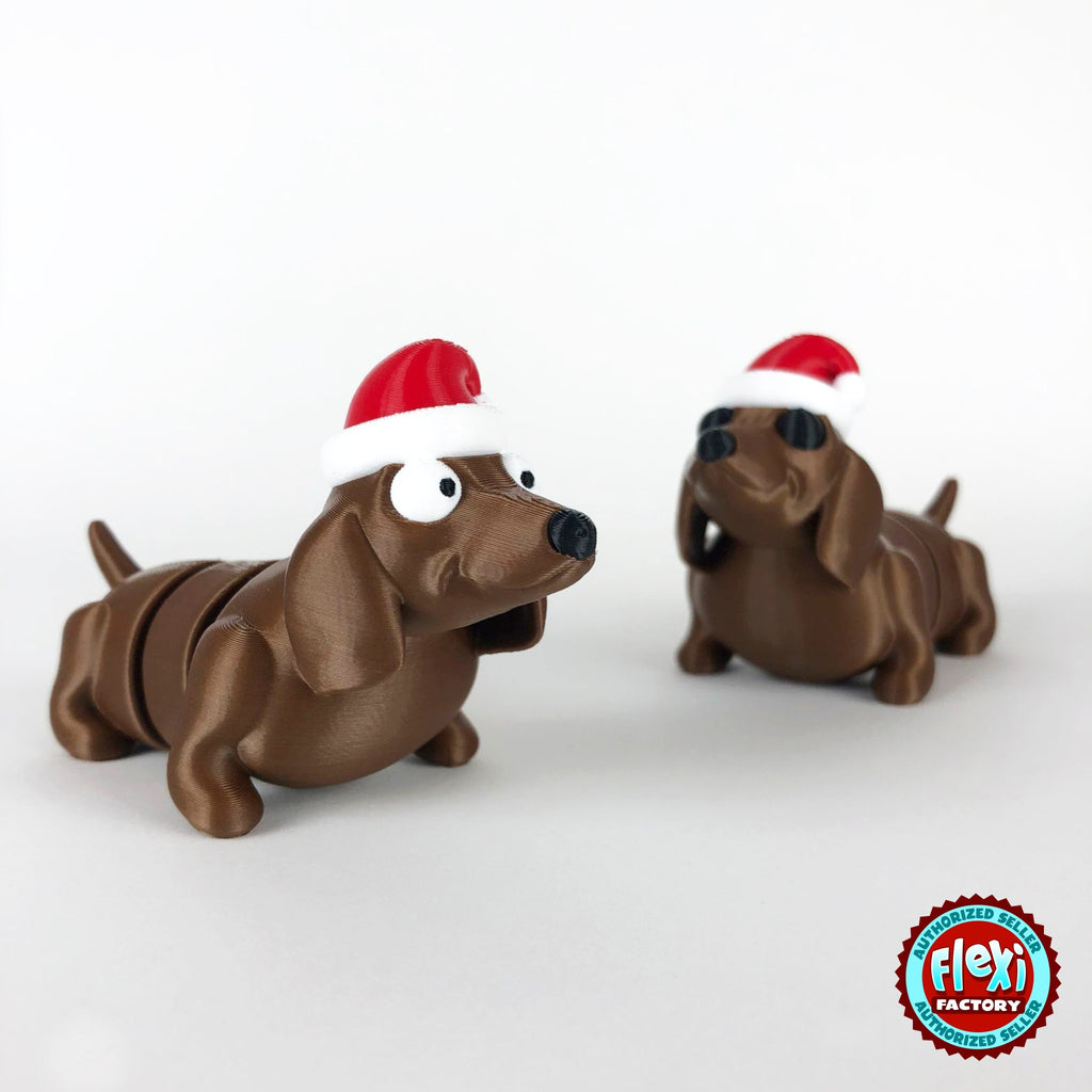 Cute Christmas dachshund keychain, 3D printed by RU3D – pair of Christmas dachshunds. Brown sausage dog with red Santa hat.