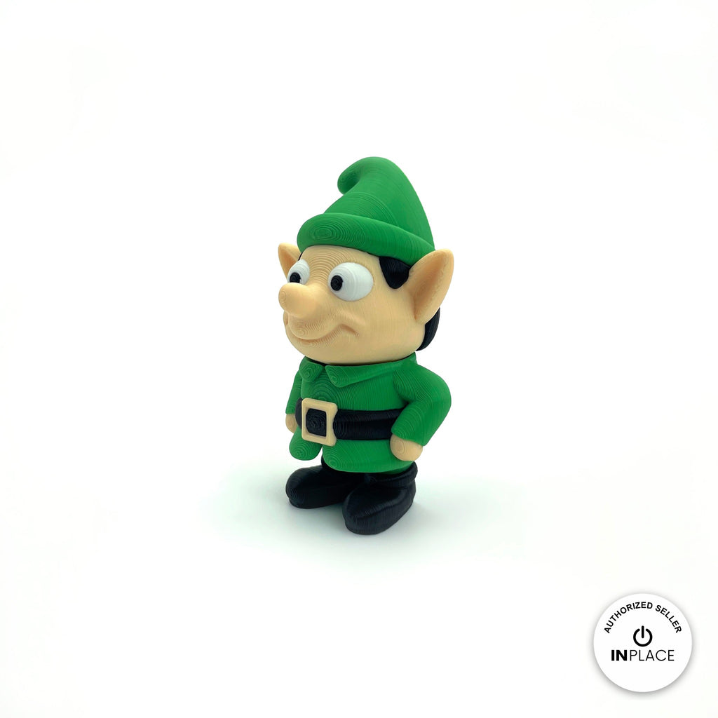 Cute Christmas elf keychain, 3D printed by RU3D – three quarter view facing left. Green outfit and hat, also in red.