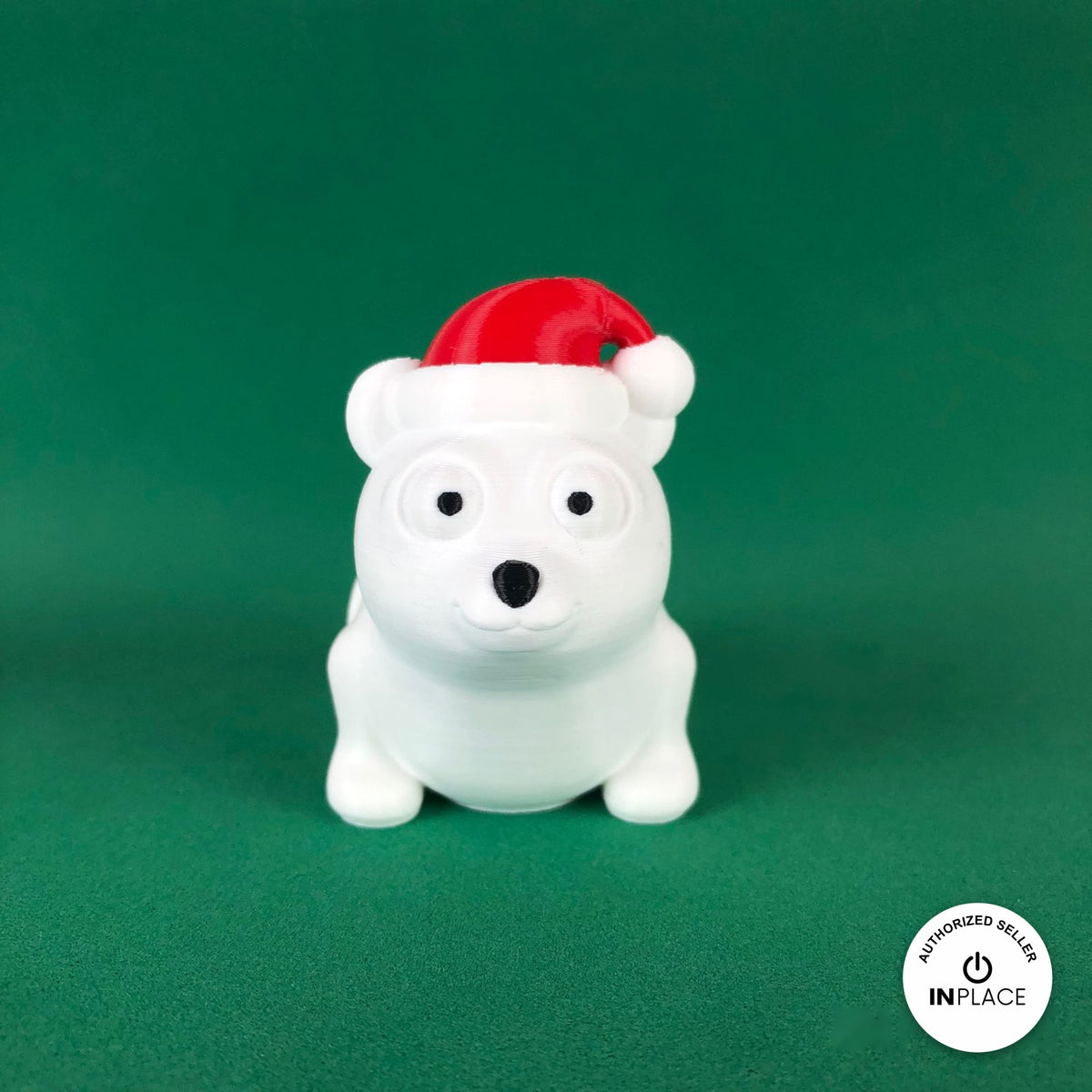 Cute Christmas polar bear keychain, 3D printed by RU3D – front view. White with red Santa hat.