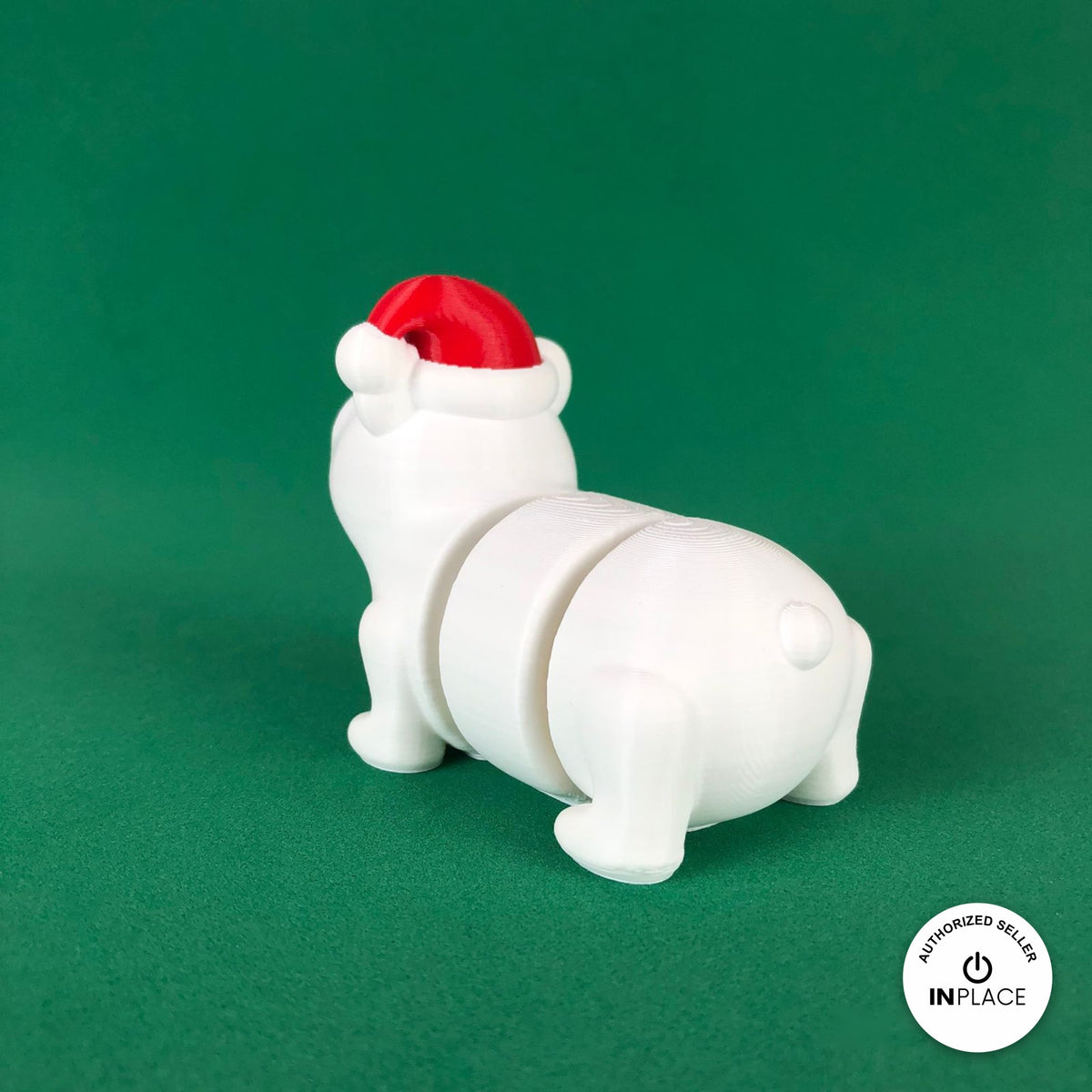 Cute Christmas polar bear keychain, 3D printed by RU3D – rear view. White with red Santa hat.