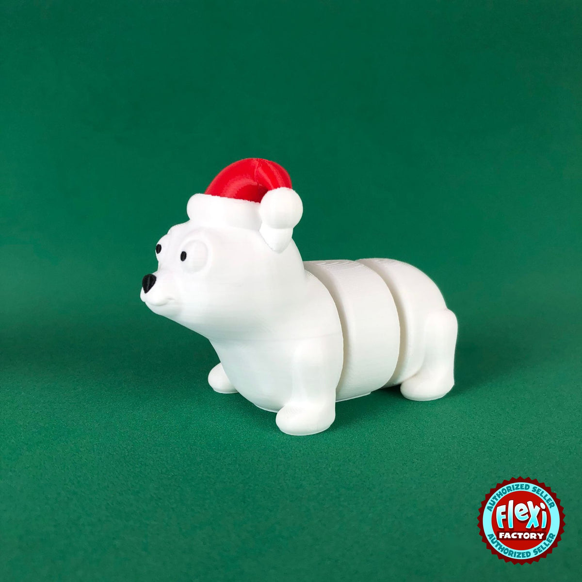 Cute Christmas polar bear keychain, 3D printed by RU3D – three quarter view facing left. White with red Santa hat.