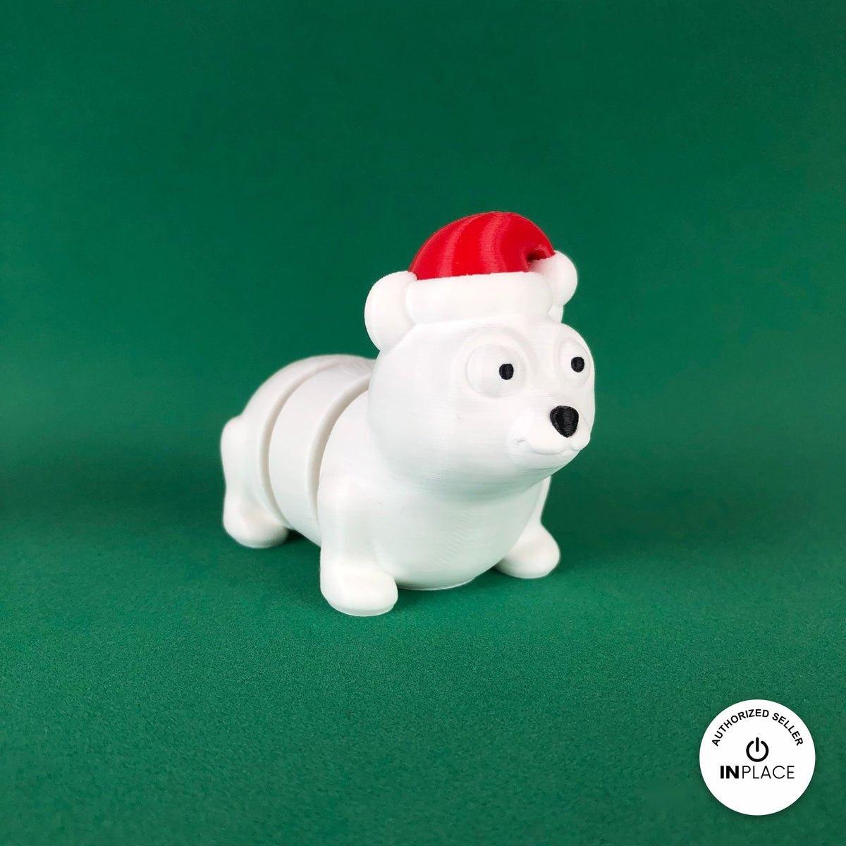 Cute Christmas polar bear keychain, 3D printed by RU3D – three quarter view facing right. White with red Santa hat.